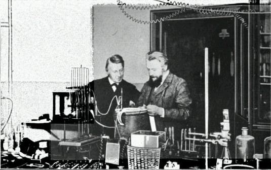 Photograph of Friedrich Ostwald with vant Hoff in a laboratory.