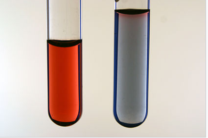 A photograph of signle-stranded DNA coated nanoparticle with and without a complementary DNA strand.